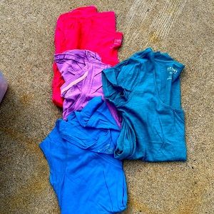 Four medium maternity shirts